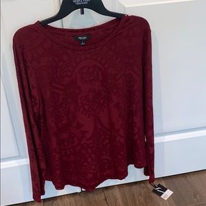 Long sleeved floral shirt. Cherry red.